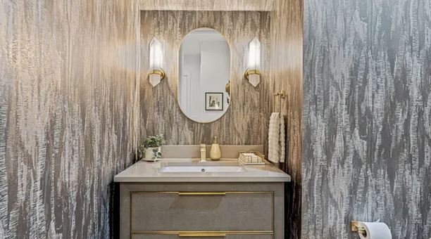 Picture of a powder bathroom with wallpaper
